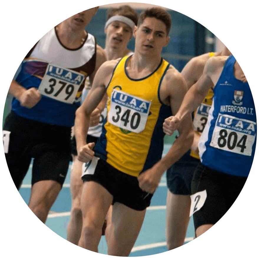 Group of athletes competing in running race