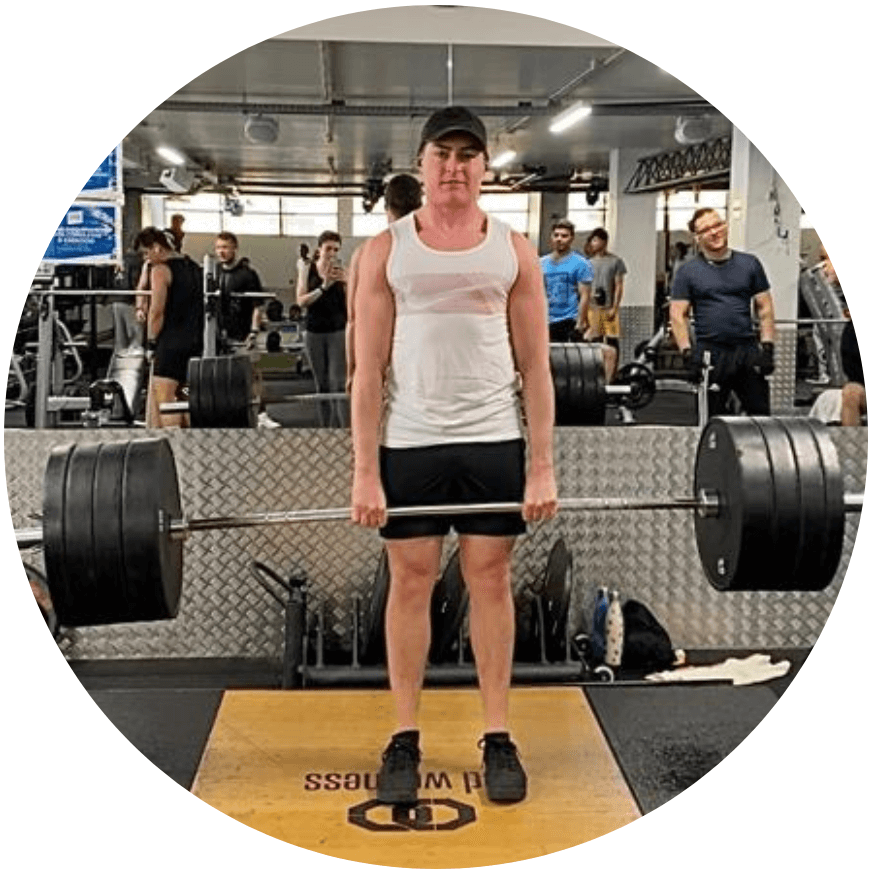 Athlete deadlifting heavy weights in gym
